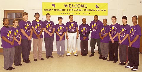 High level Sash members from Dr. Wu's school of Shaolin Kung Fu pose for a group photo with Instructor Chaantzu Ismail Saadat.